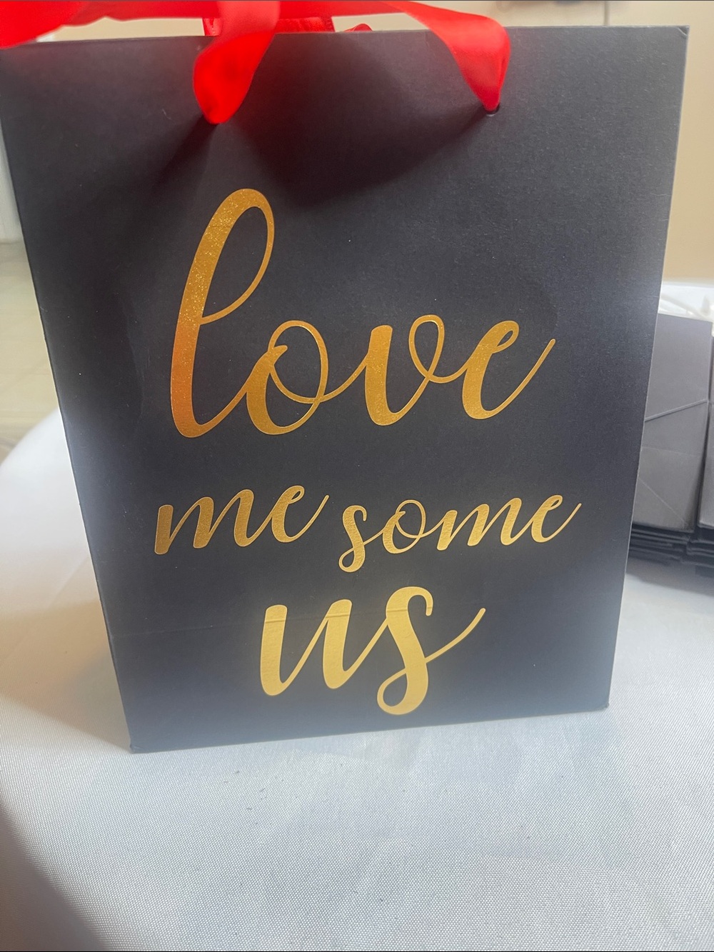 Love Me Some Us Black & Gold Gift Bag with Red Ribbon